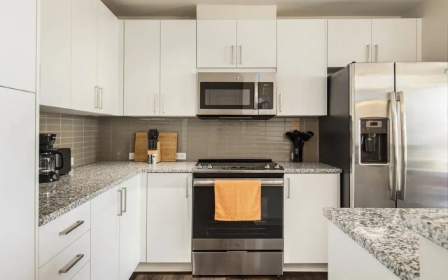 Modern Condo With Local Vibrance by Cozysuites