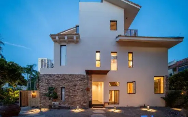 Haikou Man Manor Homestay (Wuyuan River Convention Center)