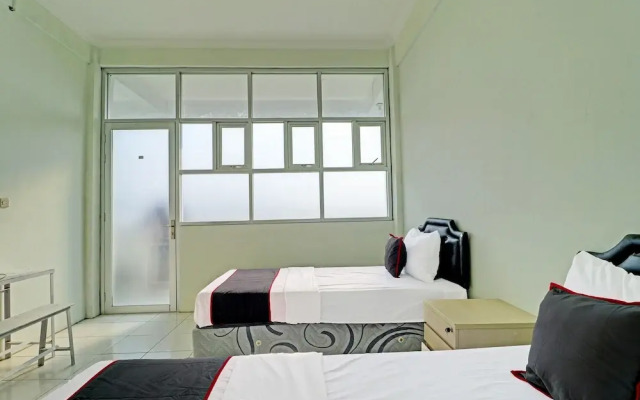 Capital O 91466 Hotel Neu Backpacker Tf Syariah (smk Tb)