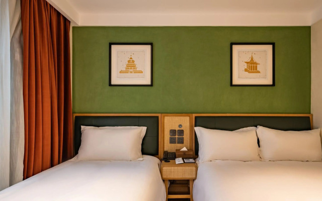 Qiuguo Hutong Courtyard Hotel