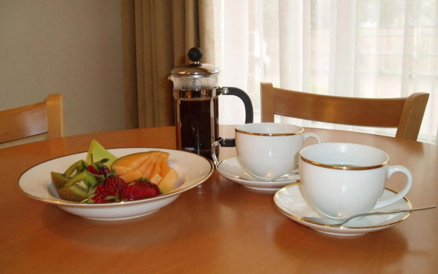 Carlyle Suites & Apartments