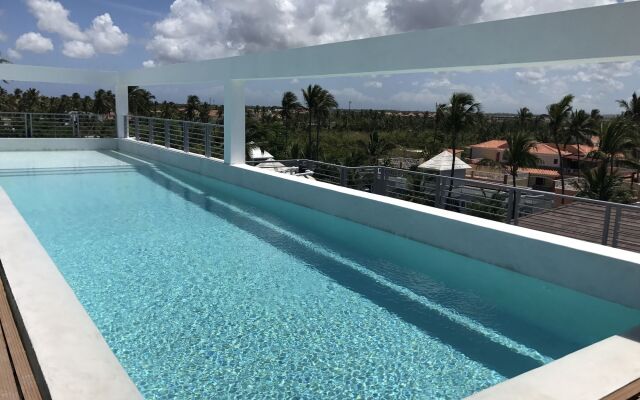 Ducassi Suites Rooftop Pool Beach Club & Spa