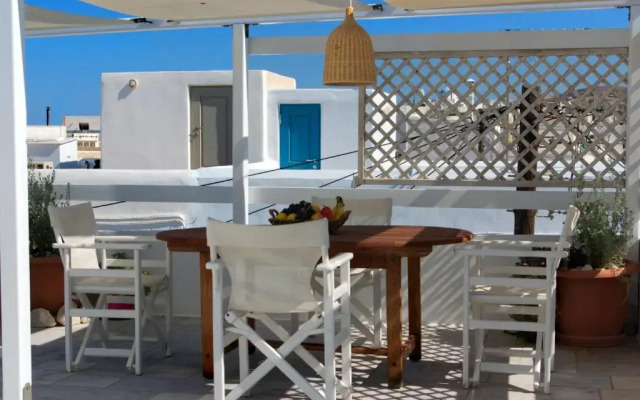 White cycladic town house with sea vew