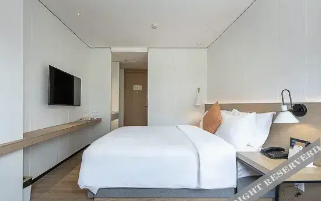 Light Stay Heng 8 Automobile Hotel