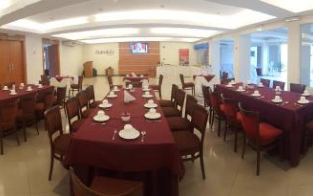 Olimpo Hotel & Suites