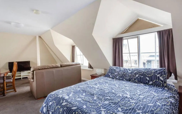 Upstairs Studio Apartment with street access