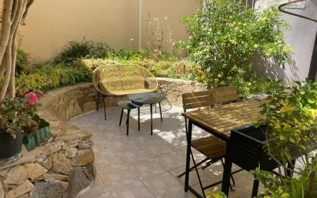 Studio spacieux avec patio en centre ville