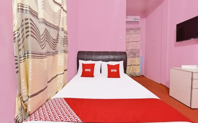 OYO 90664 Rabi Hotel
