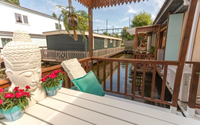 House boat studio with waterfront terrace