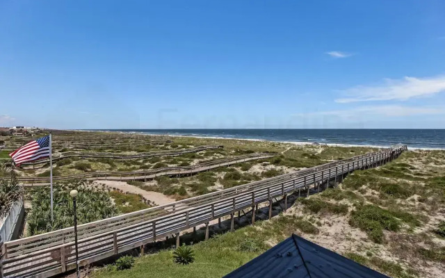 Newly Remodeled Oceanfront Condo with Salt Water Pool and Private Walkway to Beach by RedAwning