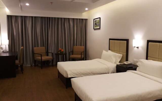 Triguna Clarks Inn