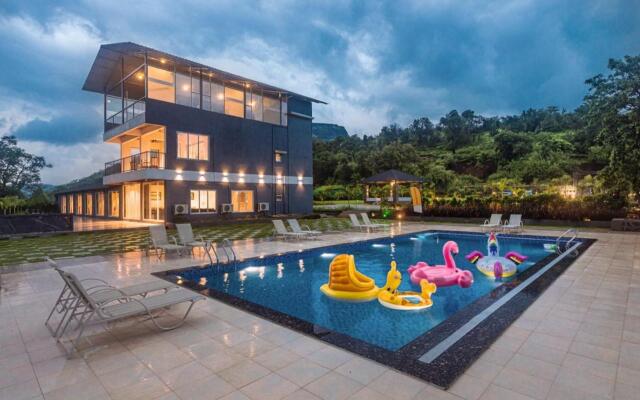 SaffronStays Sundowner Karjat party perfect pool villa with rain dance and cricket turf