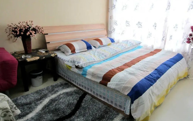 Qingdao Noah Tourist Apartment (CBD Wanda Plaza)