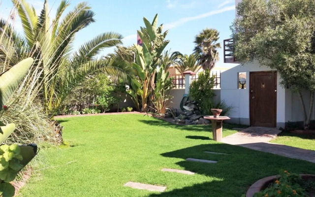 "room in B&B - Room for 6 - Amarachi Guesthouse in Swakopmund Namibia Near Beach and Malls!"