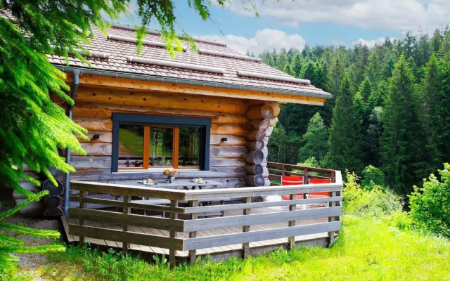 Original chalet en rondins, l'Ours Canadien