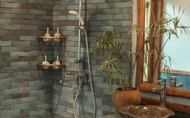Maison Que