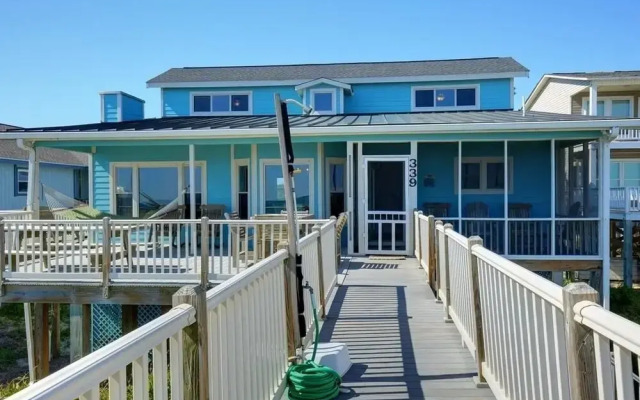 Windchimes 4 Bedroom Home by RedAwning