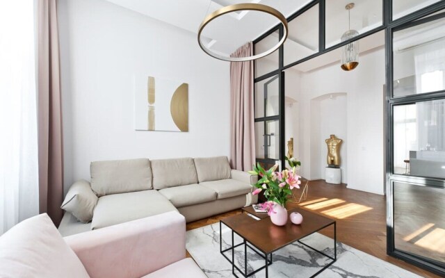 An Elegant Cozy Apartment Filled With Pieces of art gym spa Transport