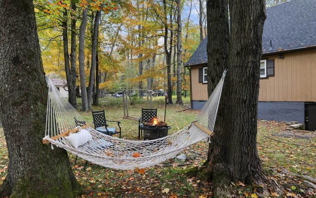Game Room & Fire Pit: Tree-lined Pocono Lake Cabin