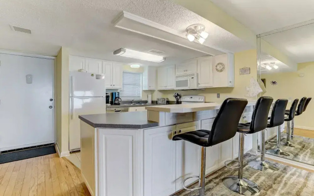 Oceanfront Beach Condo with Private Balcony, Short Walk to Pool and Beach by RedAwning