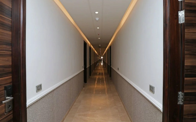 C Pearls Hotel  Banque by OYO Rooms