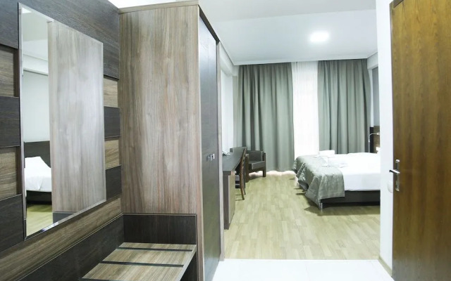 Olympus Hotel By Umbrella