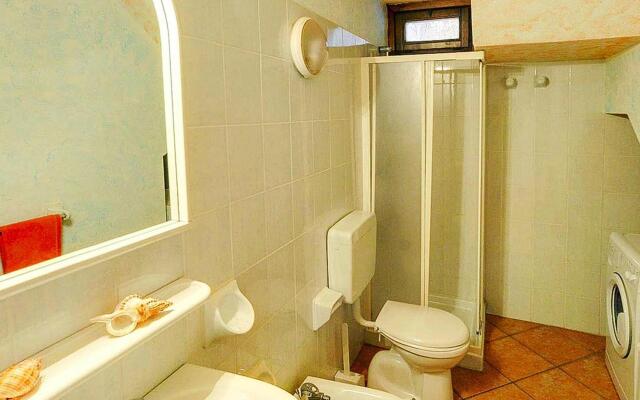 Apartment in Cannegione with communal terrace