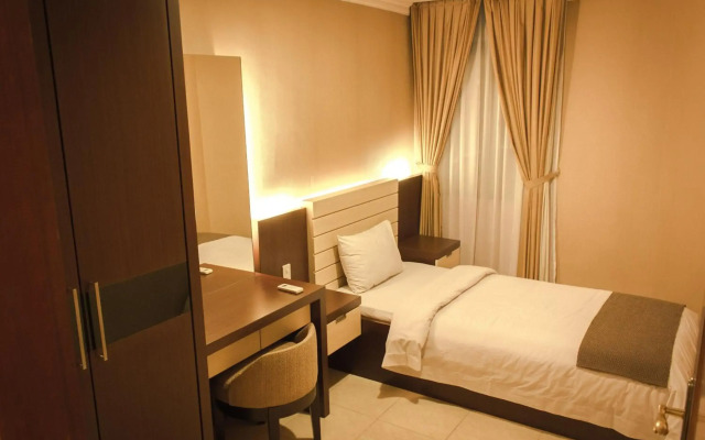 Travellers Suites Serviced Apartments
