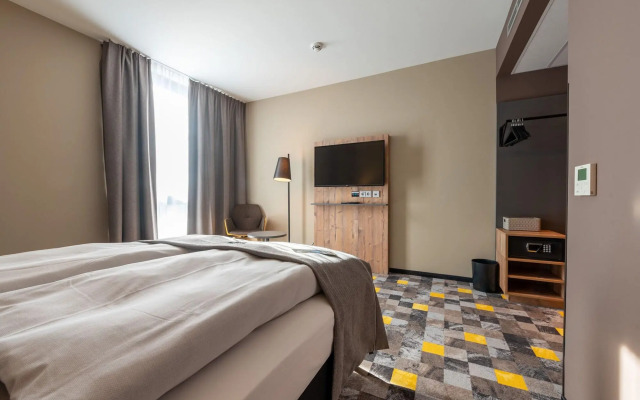Отель Holiday Inn - the niu, Timber Esslingen, an IHG Hotel