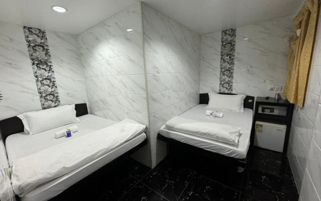 Om Guest House – Guest Rooms – Kowloon