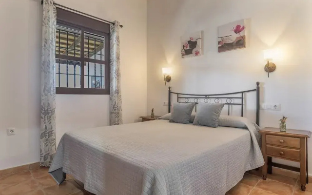Casa con piscina compartida Conil de 5