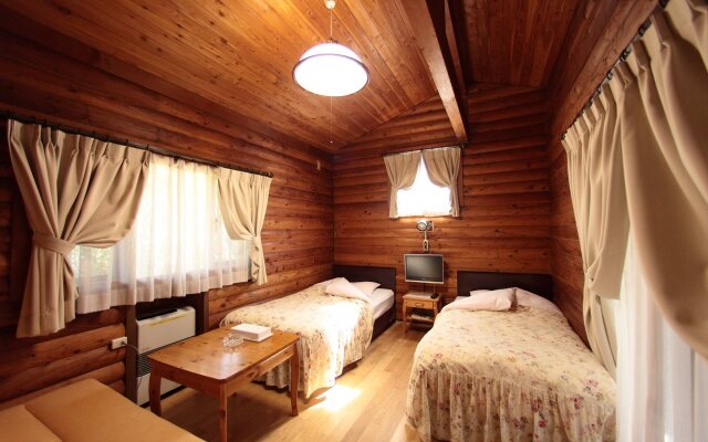 Cottage In Log Cabin