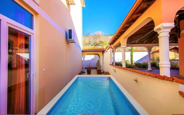 Luring Apartment in Dramalj with Hot Tub