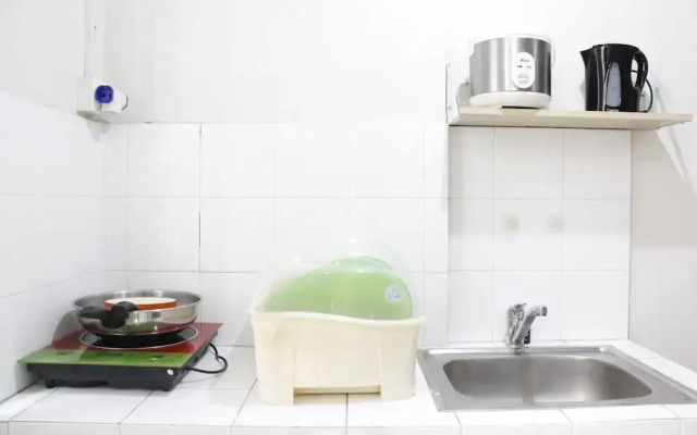 Compact Studio Room at Sudirman Suites Apartment