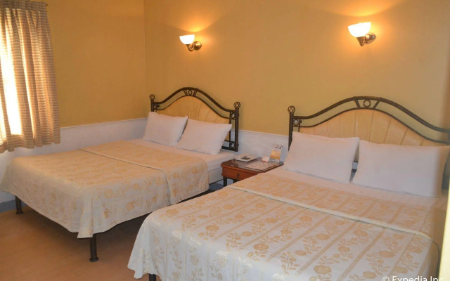 Capital O 740 Bliss Hotel Dau