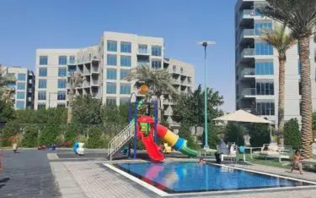 Cozy 1-bedroom apartment in Dubai South with Pool