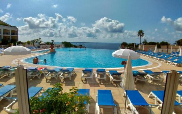 Studio cabine vue mer, piscine panoramique, parking couvert