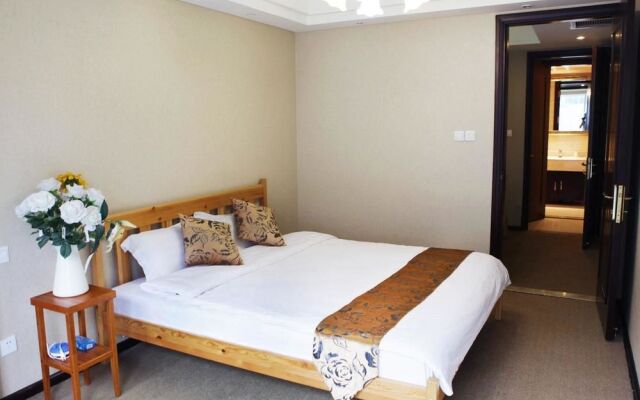 Yijia Hotel Apartment Dalian (Xinghai Daguan)