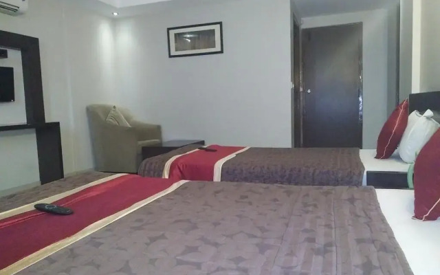 GreenWood Inn & Suites