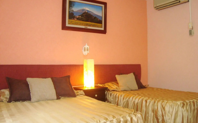 Suites Angelopolis