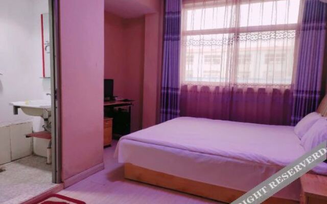 Pingdu New Home Business Hotel