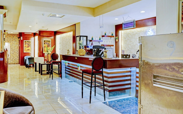 Capital O 596 Garden Palace Hotel