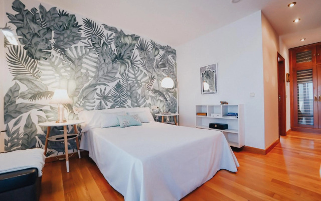 Villa con piscina a pie de playa