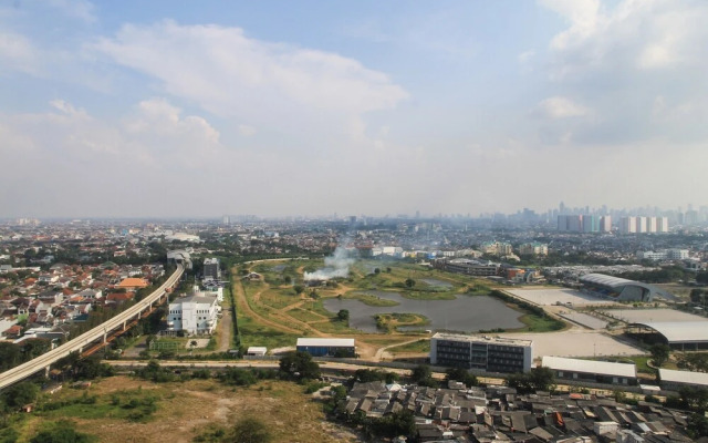 Homey Studio Tifolia Apartment