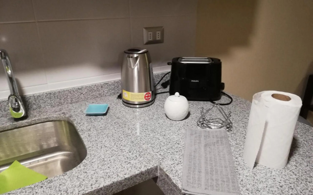 Depto 1 Dormitorio 1504 Central con estacionamiento