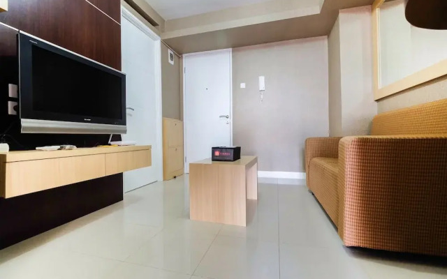 Homely 2 BR Bassura City Apartment By Travelio