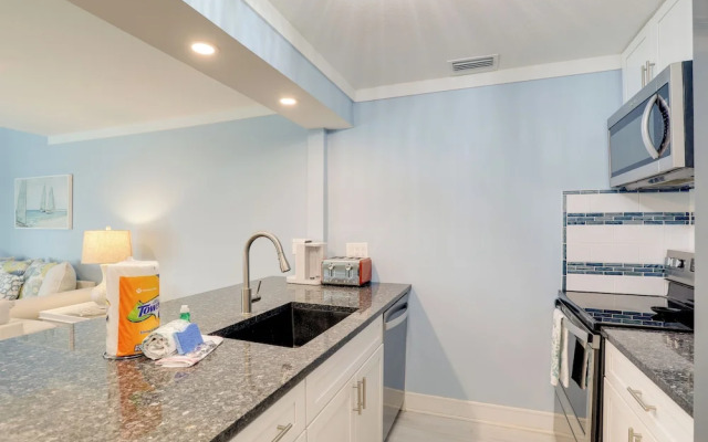 Poolside Madeira Beach Abode w/ Balcony!