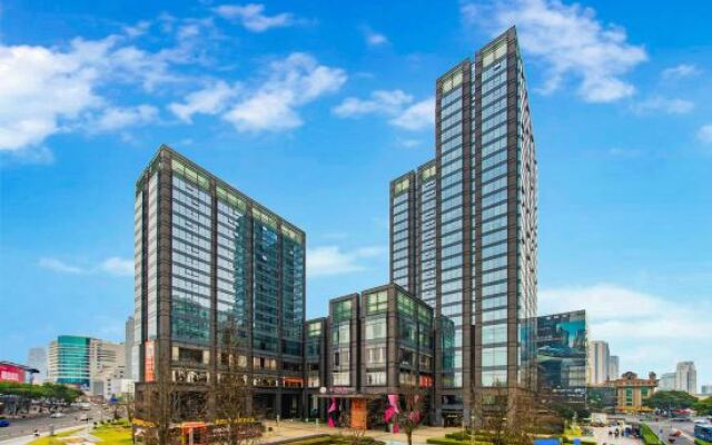 Gomine Apartment Hotel (Ningbo Yinyi Global Center)