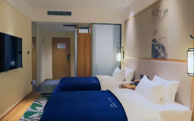 Qianxi Hotel (Zhengzhou Zhongzhou Avenue Yangjun Liu Subway Station Branch)