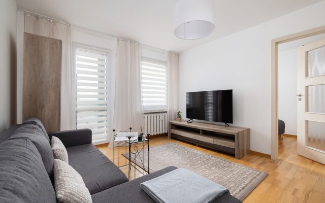 Grey Apartment in Katowice by Renters
